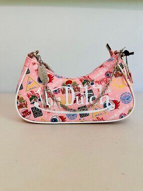 VON DUTCH FAUX LEATHER PINK JAX GRAFFITI PRINT SHOULDER BAG WITH BAG CHARM